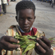 Children selling khat in Mogadishu, Somalia.
